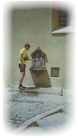 3.jpg (Konrad filling up in Assisi)